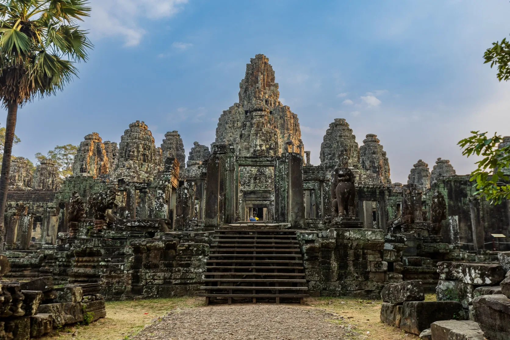Bayon's carved stone towers above a stairway at Angkor.